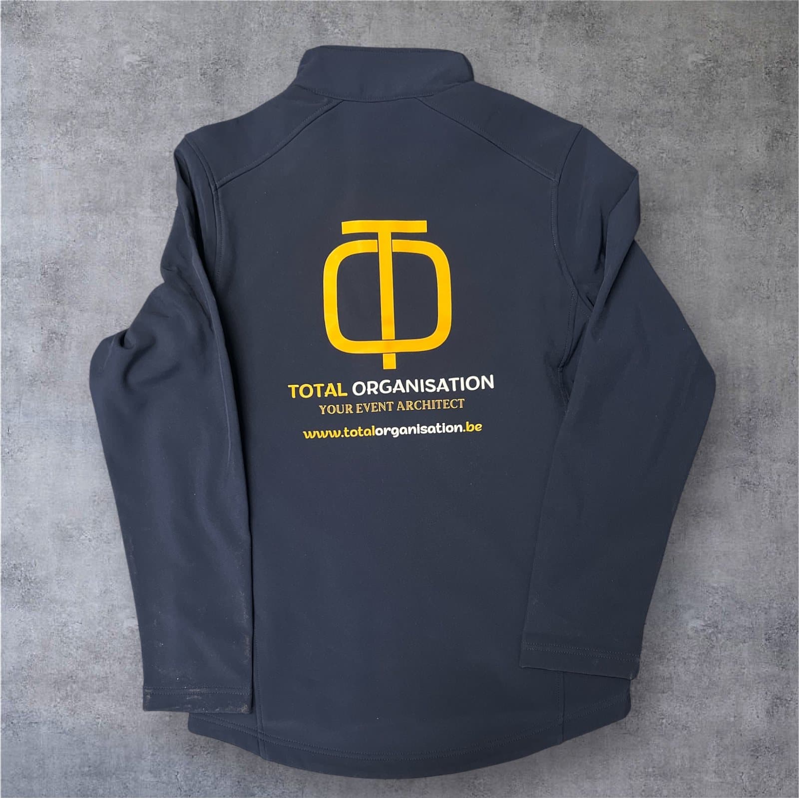 Veste marine imprimée au dos au logo d'une agence événementielle